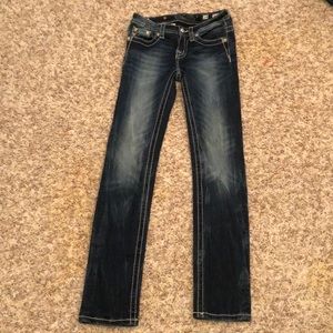I am selling a pair of Miss Me bling jeans